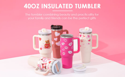 Set of insulated tumblers with various designs on a pink background