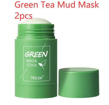 Green tea mud mask stick with lid on a white background
