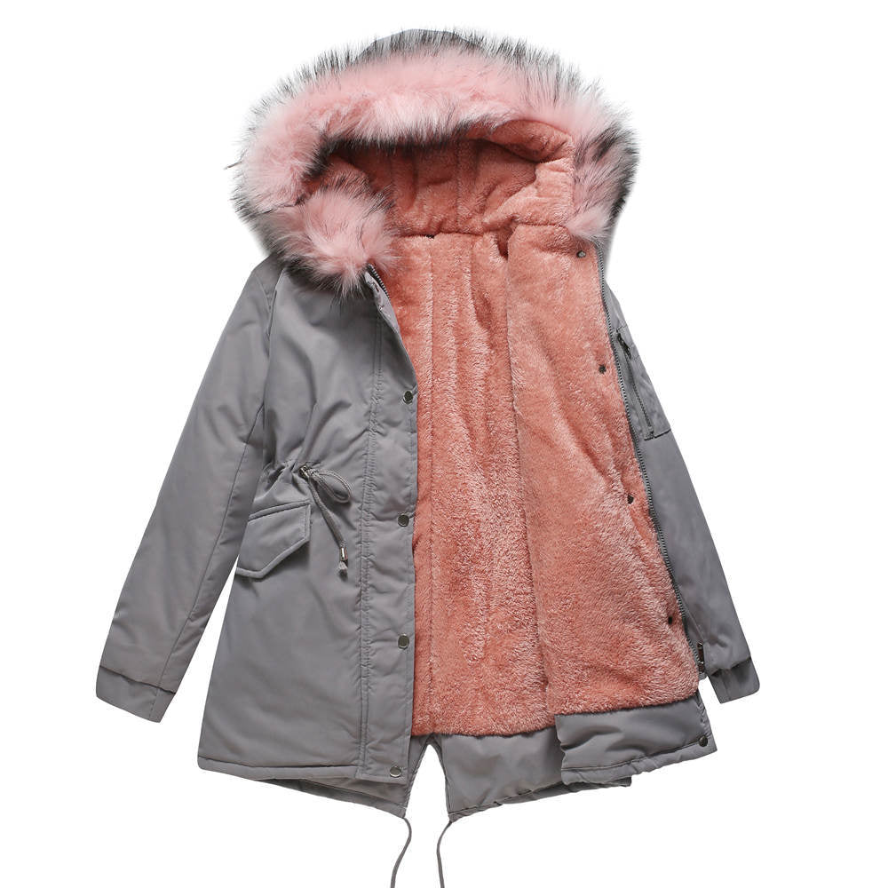 Two-tone parka with pink fur lining on a white background