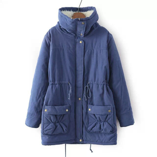 Blue winter coat with pockets and a hood on a white background