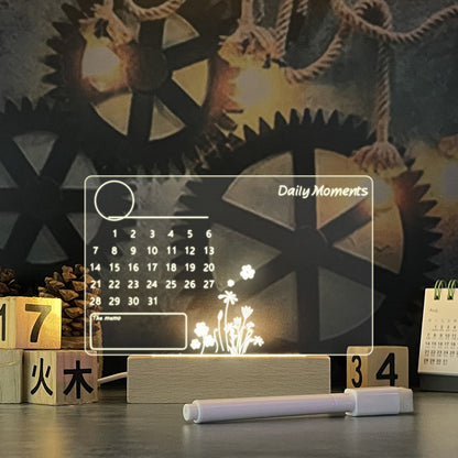 Transparent calendar with floral design on a wooden block and gear background