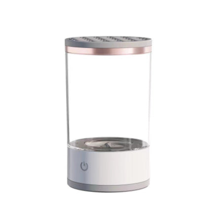 White and rose gold electronic device on a white background